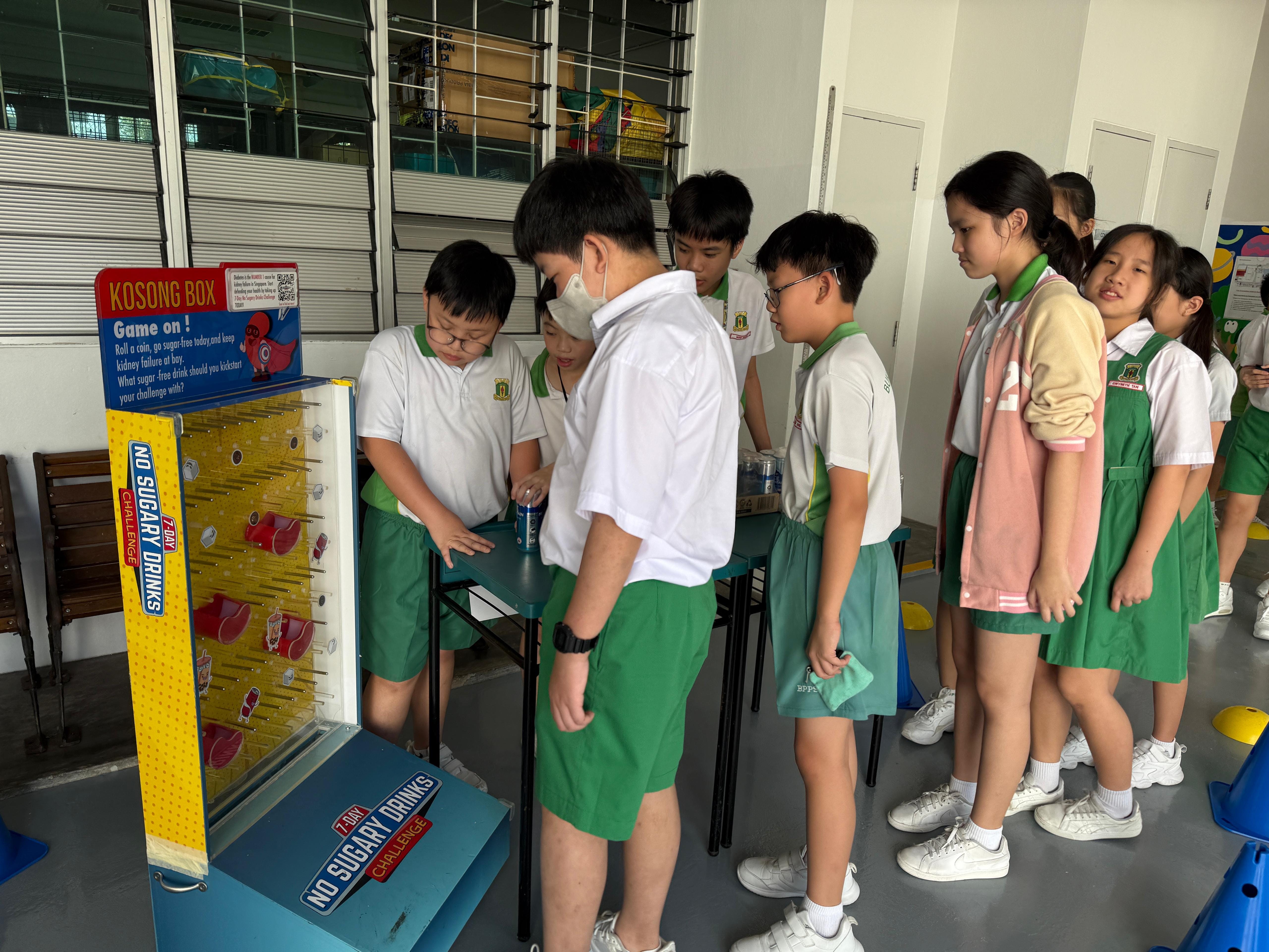 students waiting to play a game